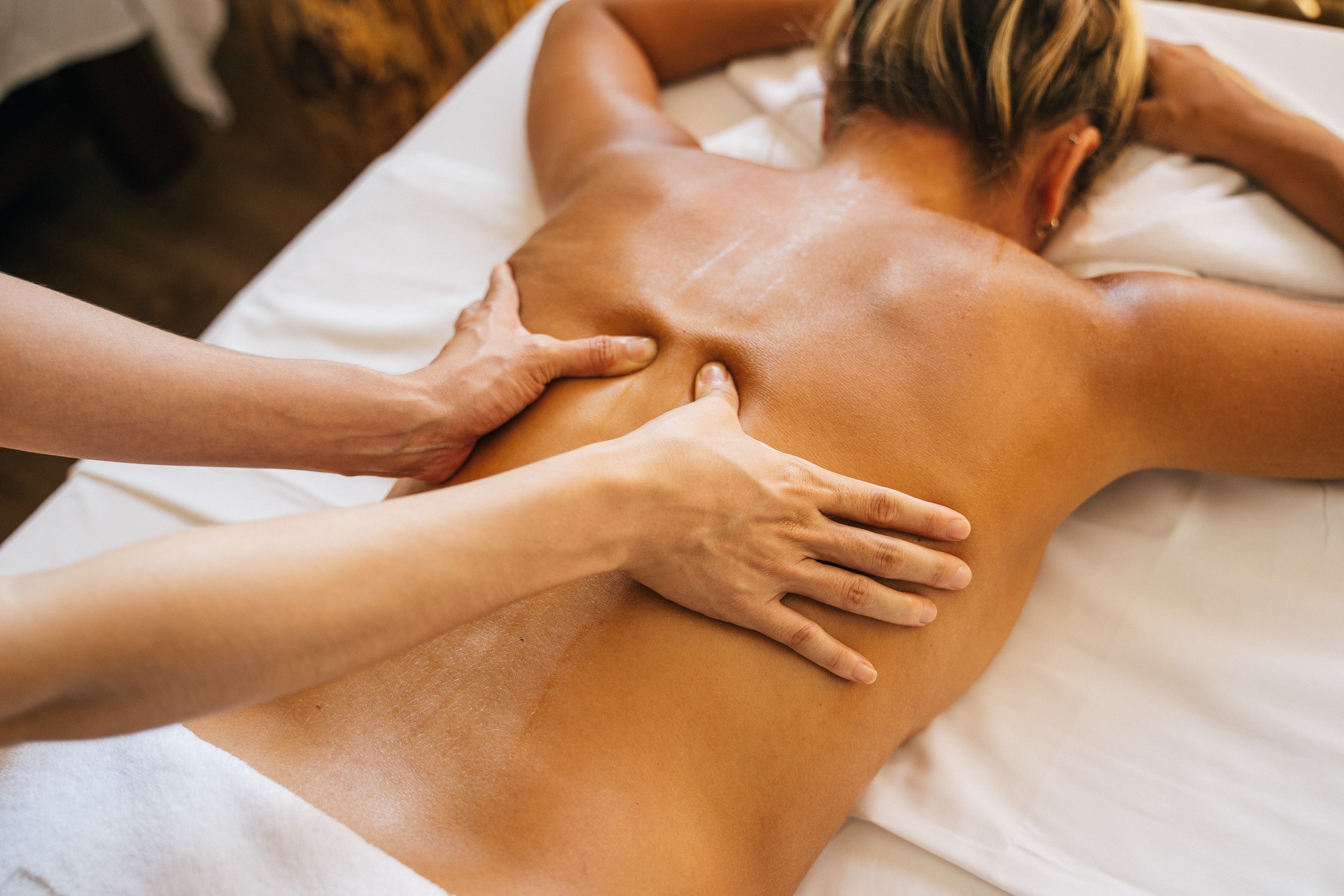 Woman getting a deep tissue massage in Santa Ynez, CA.